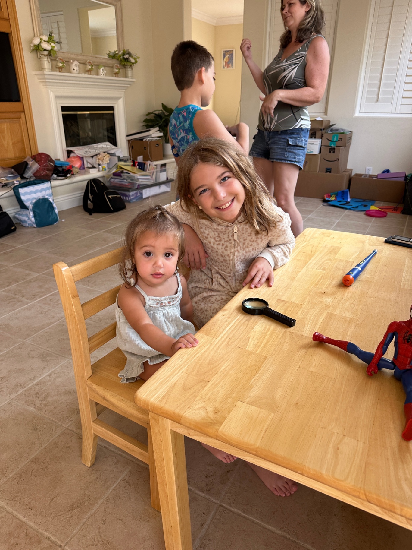 Kayli helping a toddler