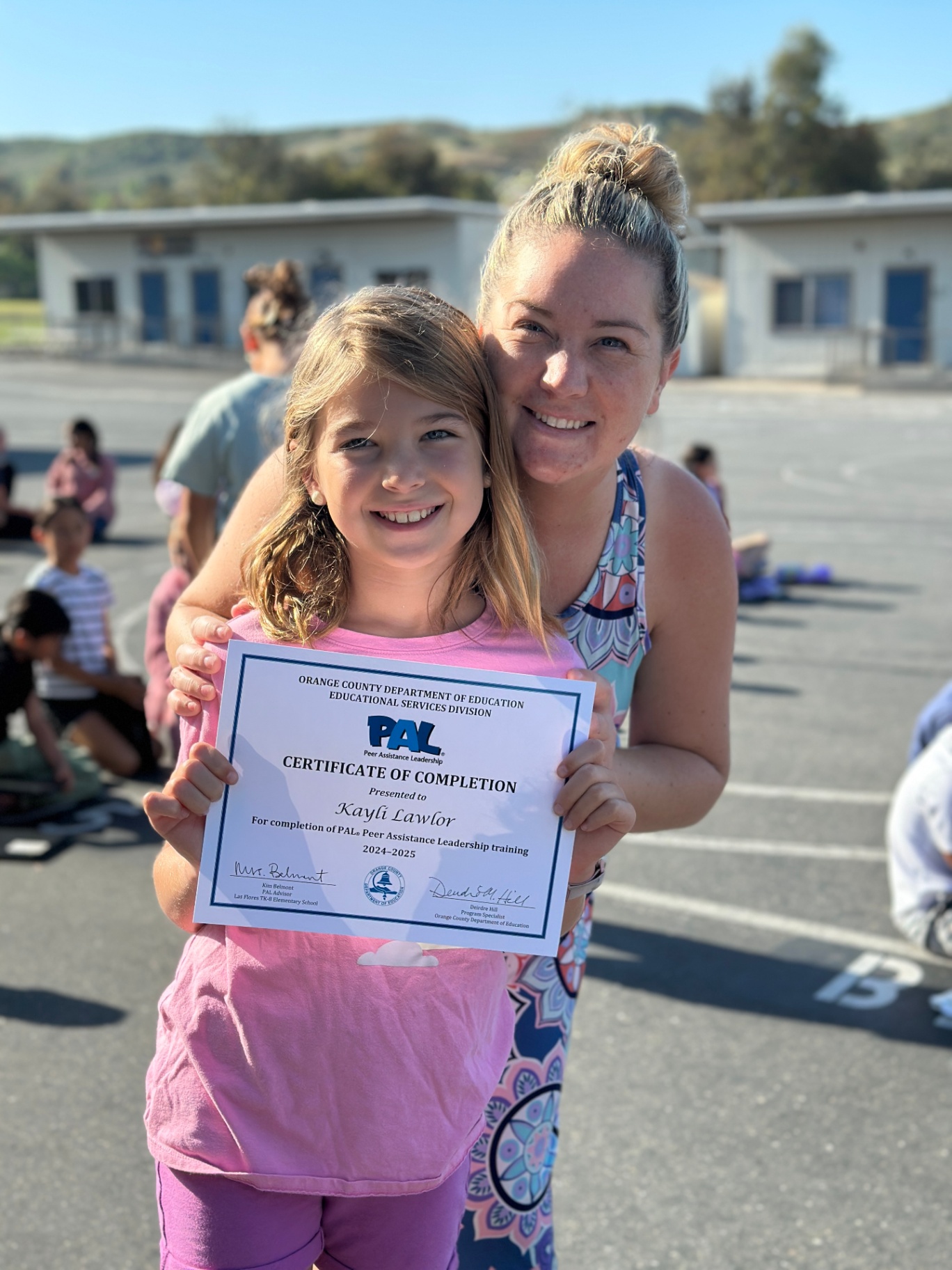 Kayli with her PAL certificate